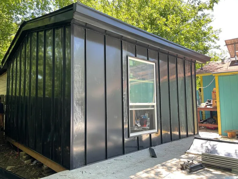 Black standing seam metal wall panels for Roof Inspection in Port Huron